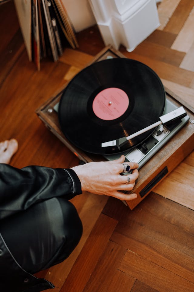 welcome image of someone spinning a record